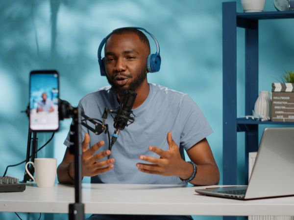 A man recording video for social media